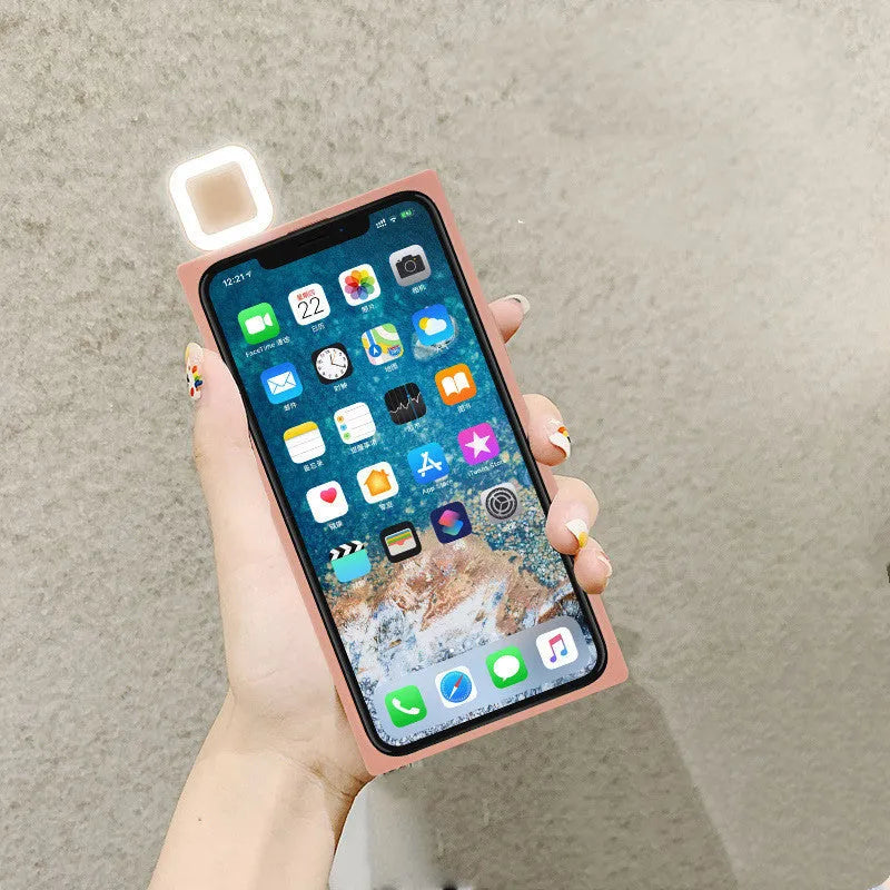 Ring flashing mobile phone case for iPhone 13 in solid colour with integrated selfie light.