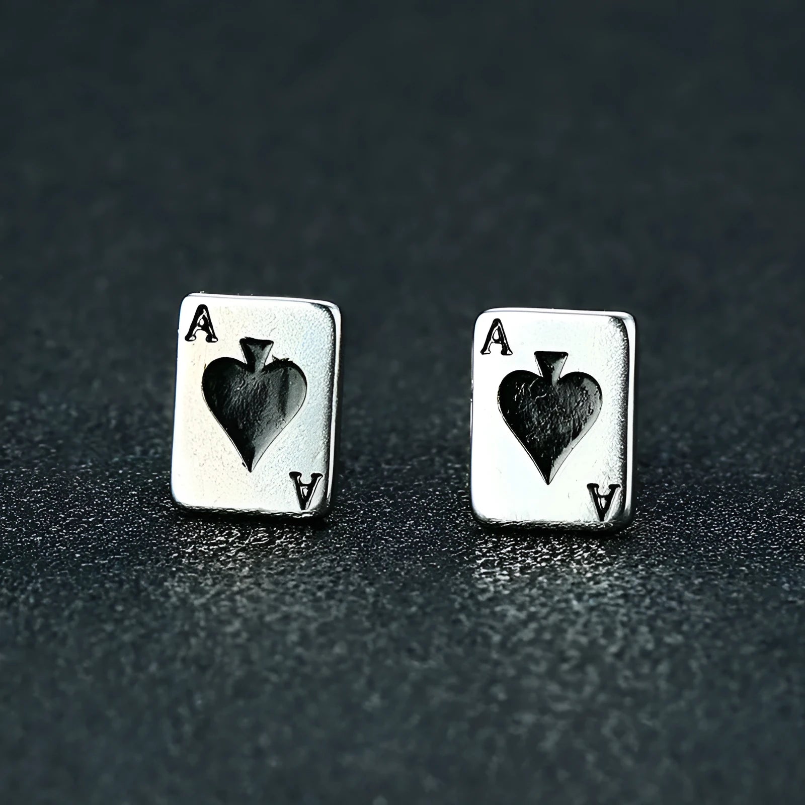 Black and white peach stud earrings with geometric quadrilateral shape in titanium steel, simple small design