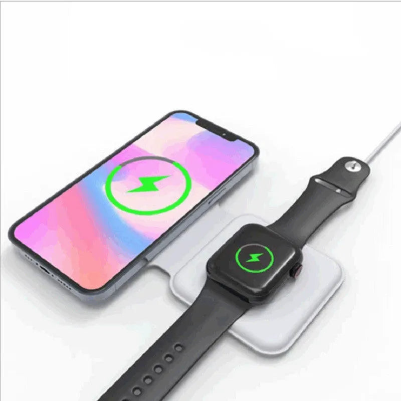 White foldable magnetic wireless charging dock showing two phones charging simultaneously at an angle.
