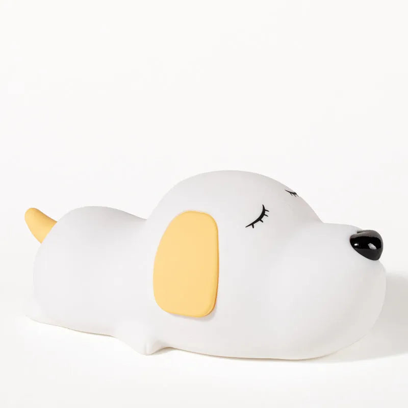 Silicone cartoon dog night light with two-colour design, powered by a USB cable.