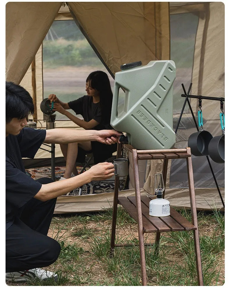 Green portable water storage tank in 13 litre snail design and 18 litre back design