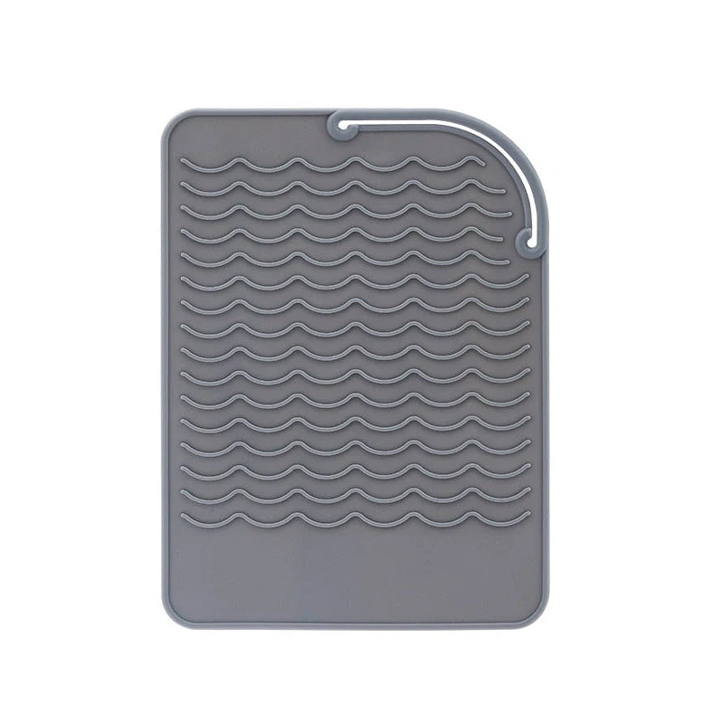Silicone heat-proof mat for hair styling tools in pink, green, dark blue, or grey