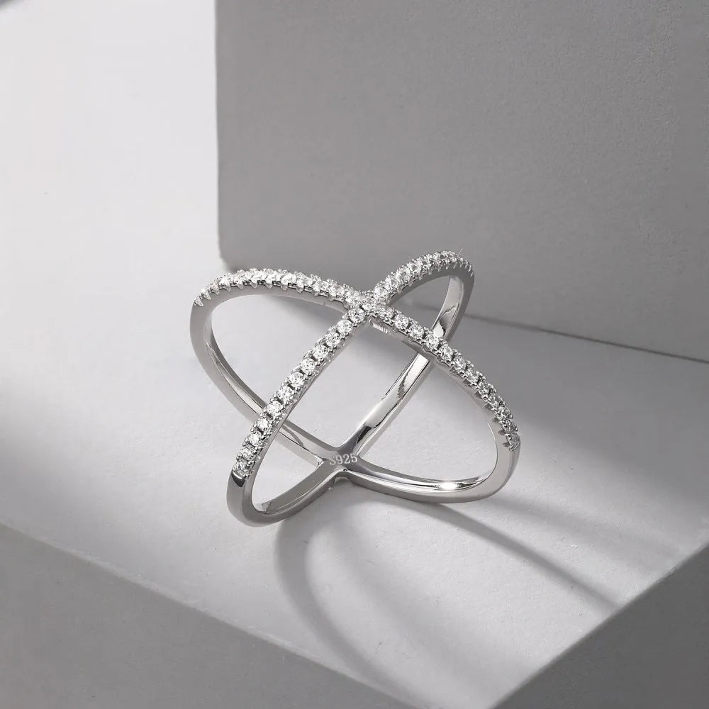 Zircon inlaid cross S925 sterling silver ring for women in silver colour on white background