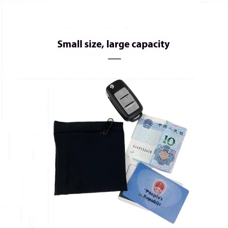 Compact 10 by 10.5 cm black armband sleeve for mobile phone, shown with packaging.