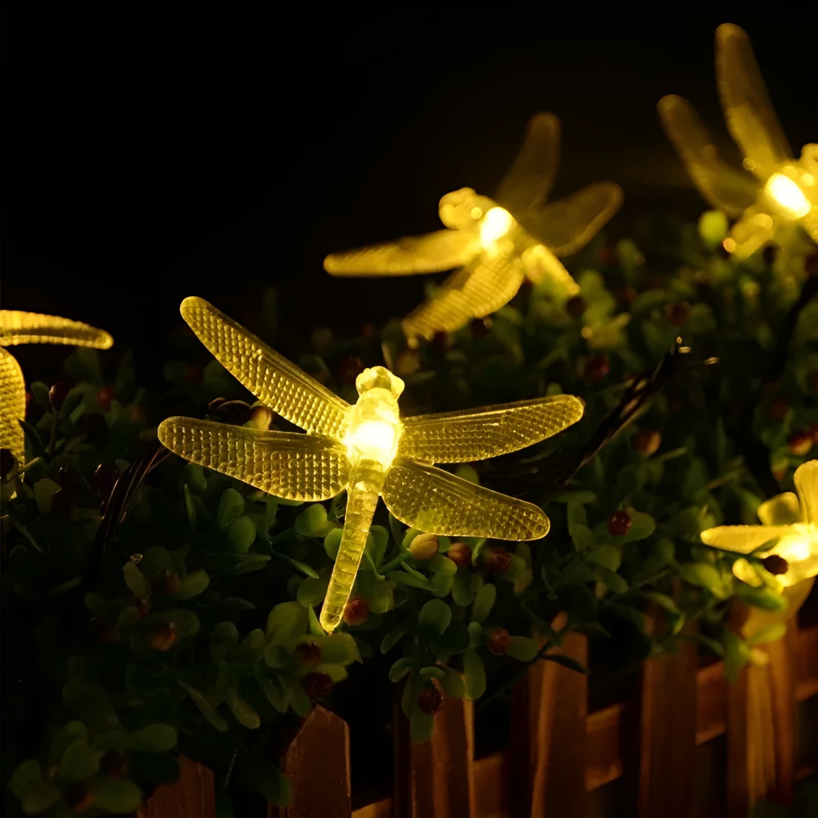 Outdoor solar-powered dragonfly LED string lights with garden spike-mounted panel