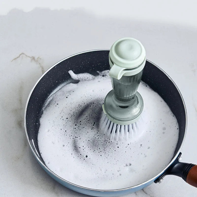 Pot brush with soap dispenser in mint green colour showing replaceable brush head and non-scratch bristles