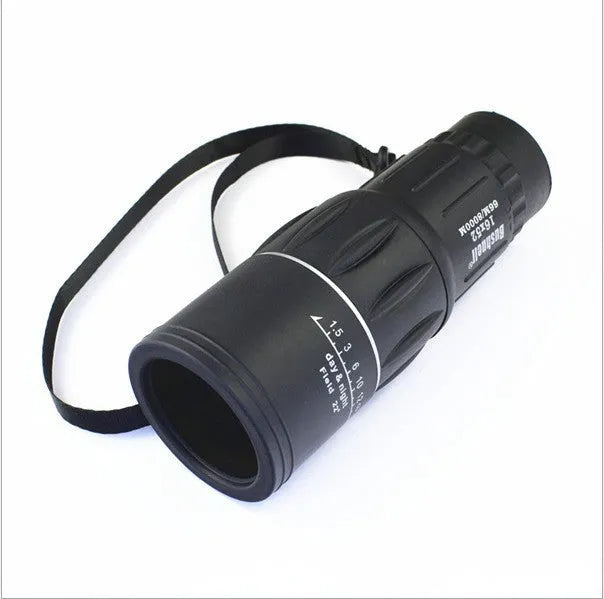 Black 16x52 monocular with large objective lens, shown with focus wheel and BAK4 roof prism optical design.