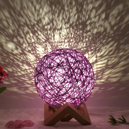 LED rattan table lamp with hand-knit lampshade in various colours