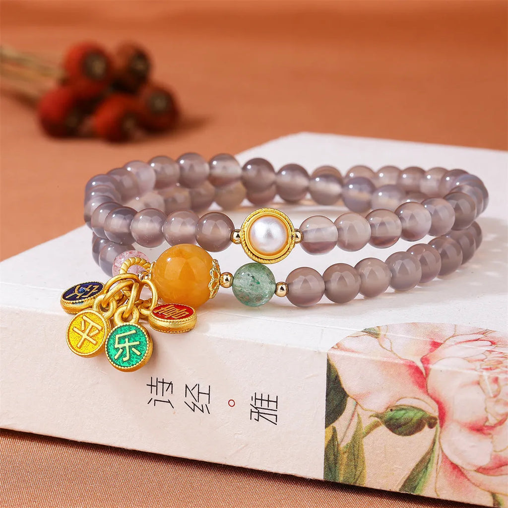 Women's handmade gray agate bracelet with a two-circle safe and happy retro design.