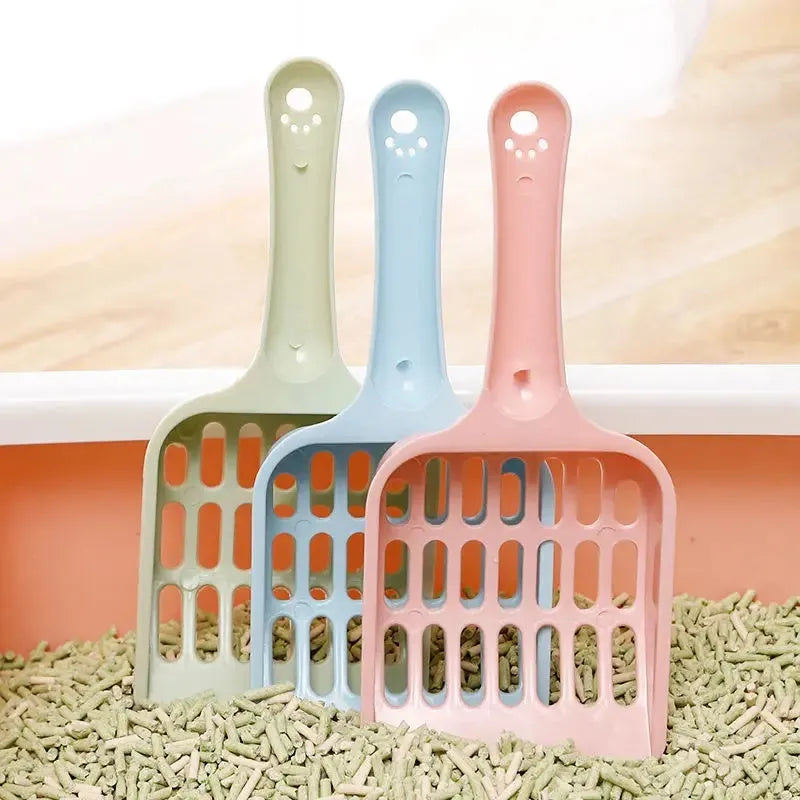 Blue plastic cat litter scoop showing 20cm length and slotted design for sifting pet litter