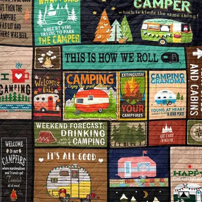 Outdoor camping blanket made from soft 100% polyester in a picnic setting with green grass background