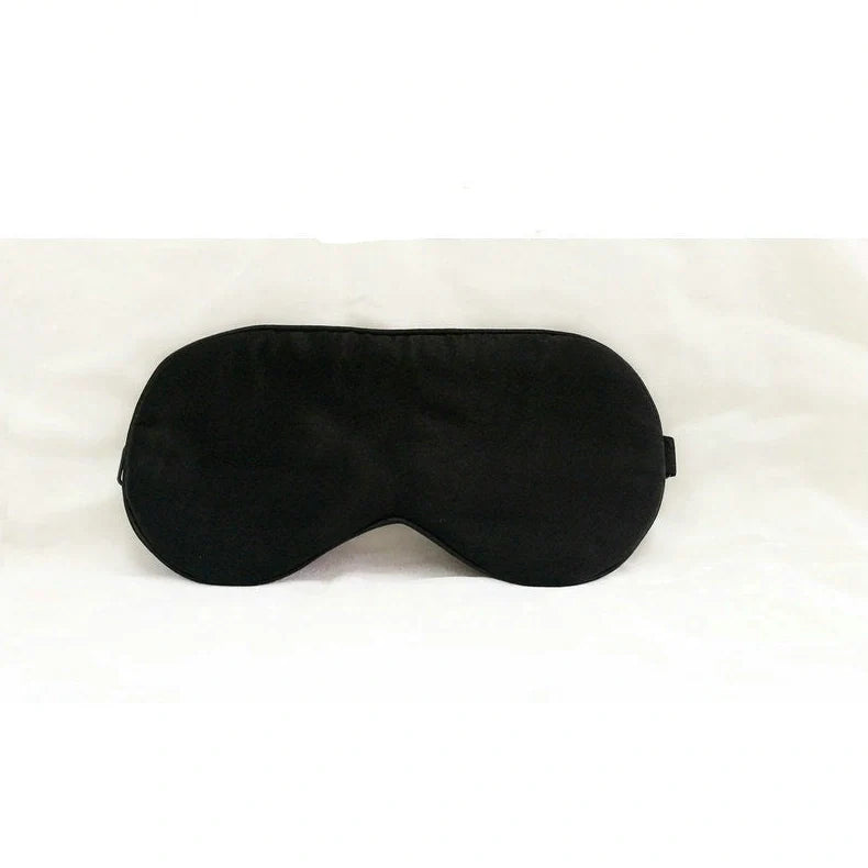Silk eye mask with ice cube gel insert showing navy blue colour and adjustable strap