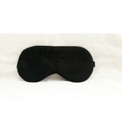Silk eye mask with ice cube gel insert showing navy blue colour and adjustable strap