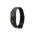 Waterproof motion intelligent hand ring fitness tracker in multiple colours on a finger.