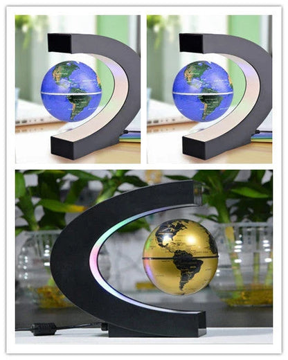 Magnetic levitation globe floating above base with LED light on