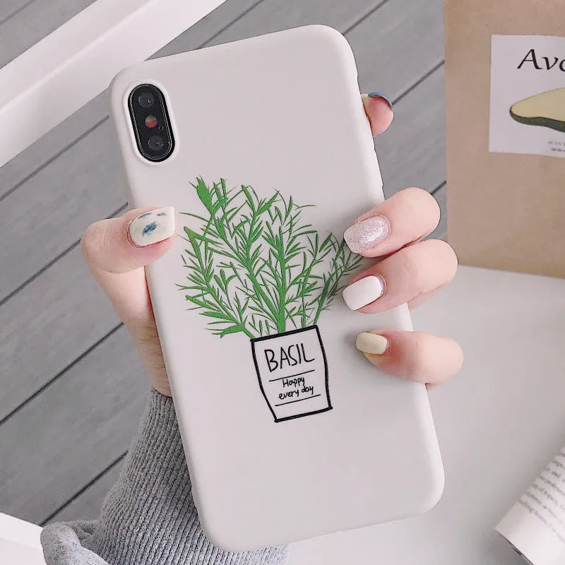 White silicone iPhone case with painted plant pattern design showing 360-degree edge protection