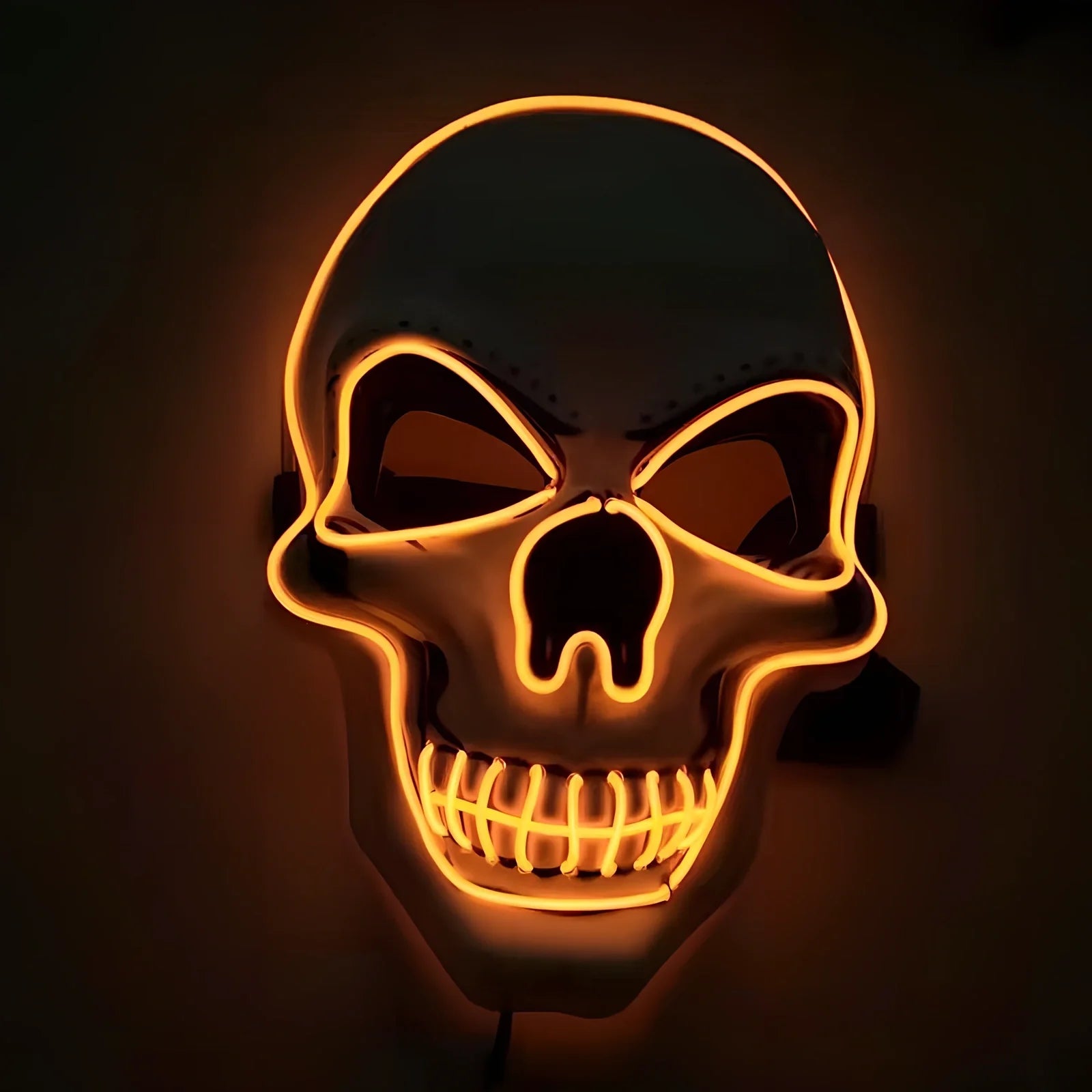 LED illuminated skull Halloween mask with adjustable strap and multiple light settings
