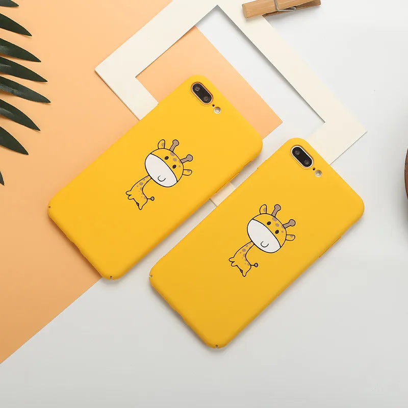Yellow patterned hard plastic phone case for Apple iPhone models on a flat surface.