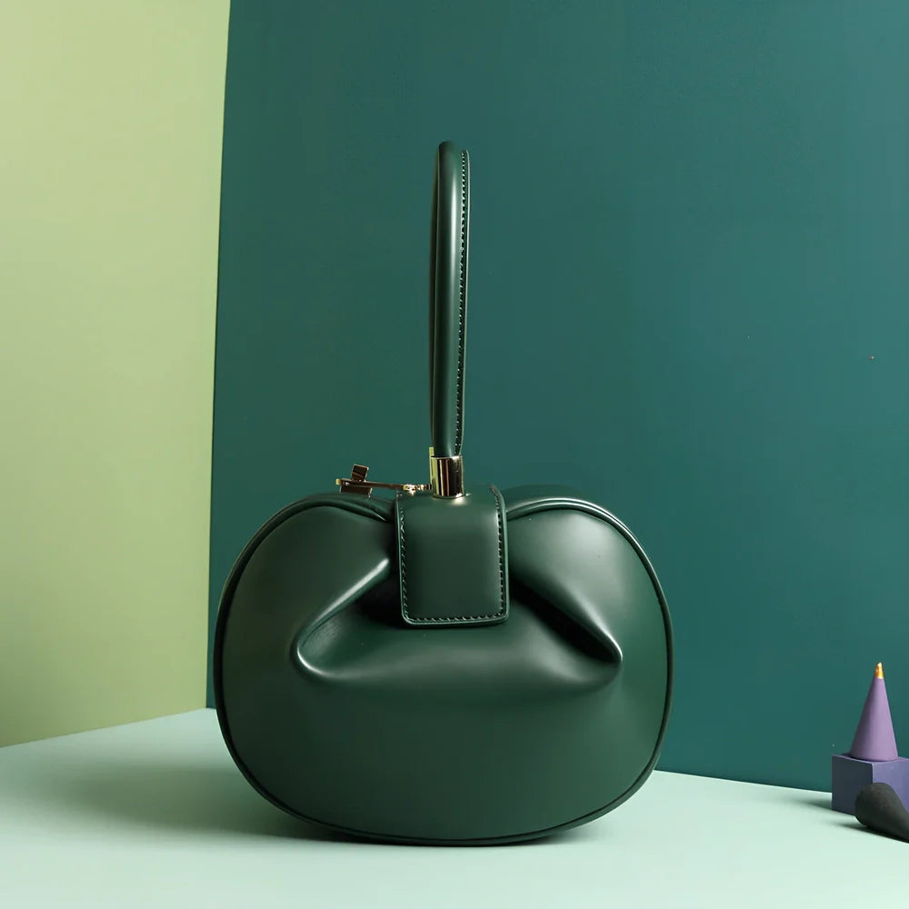 Women's cowhide leather tote bag in tramp shape with single handle and buckle, available in apricot, black, and other colours, big size 35cm x 40cm