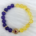 Handmade women's crystal bracelet with amethyst stones in yellow and purple colours