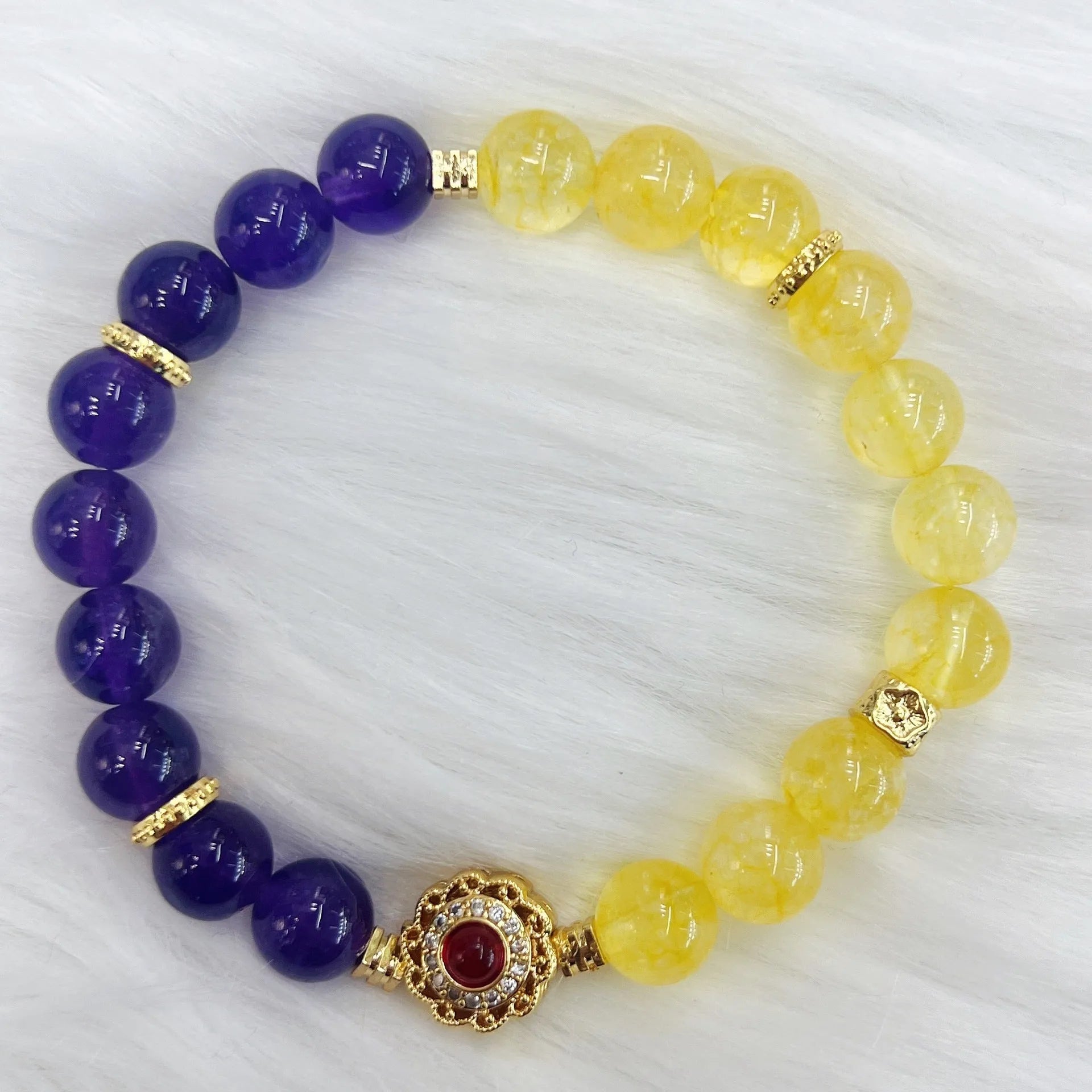 Handmade women's crystal bracelet with amethyst stones in yellow and purple colours