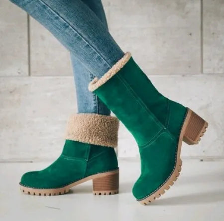 Women's black suede mid-calf Martin boots with a round toe and low flat heel.