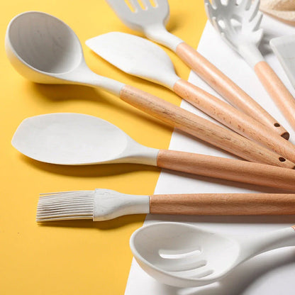 Elegant marbled silicone kitchenware set with wooden handle, perfect for cooking and baking.