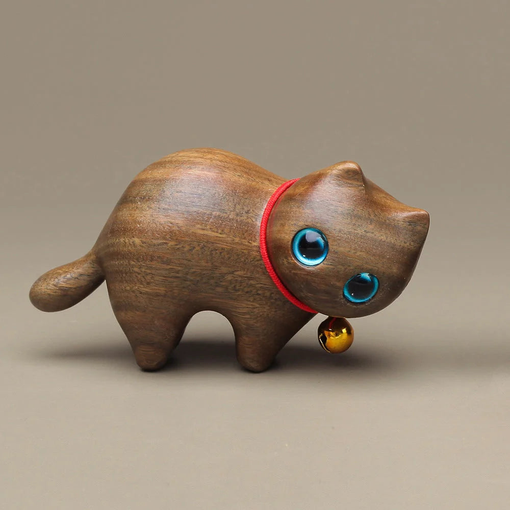 Handcrafted sandalwood kitten ornaments in various styles and colours