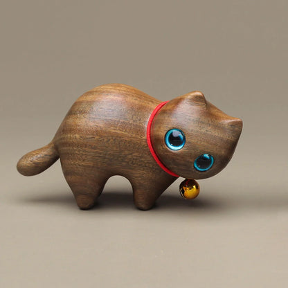 Handcrafted sandalwood kitten ornaments in various styles and colours
