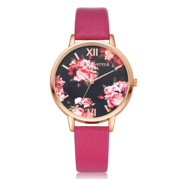 Rose gold women's watch with leather strap and love heart design
