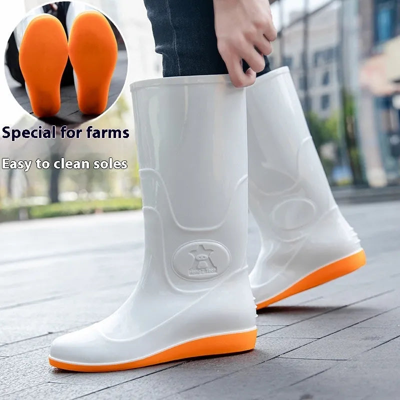 White and yellow high tube plastic rain boots with flat heel and round toe.