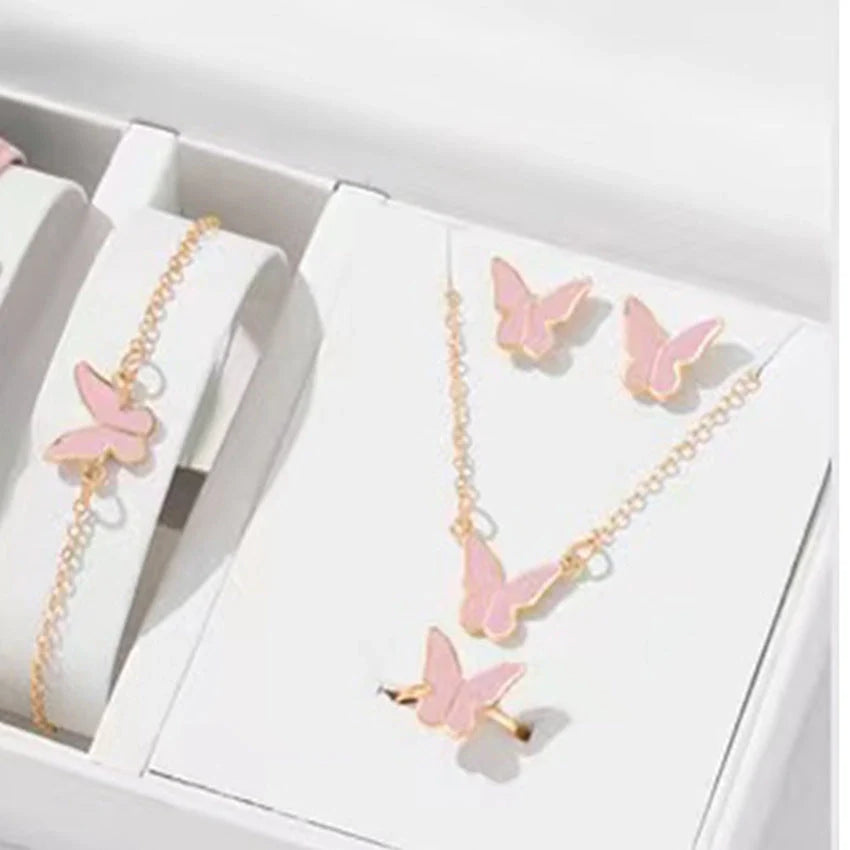 5-piece butterfly pendant jewellery set for women, including necklace, earrings, ring, and bracelet in various colours