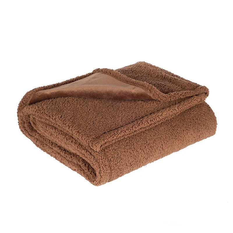 Cozy and comfortable pet blanket for dog kennels, made with flannel, wool, and sherpa for maximum warmth and style