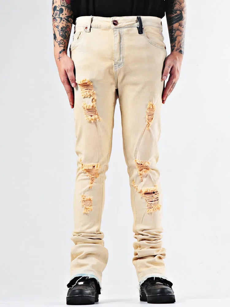 Stone washed medium high waist flare jeans in apricot cotton stretch denim with zipper fly