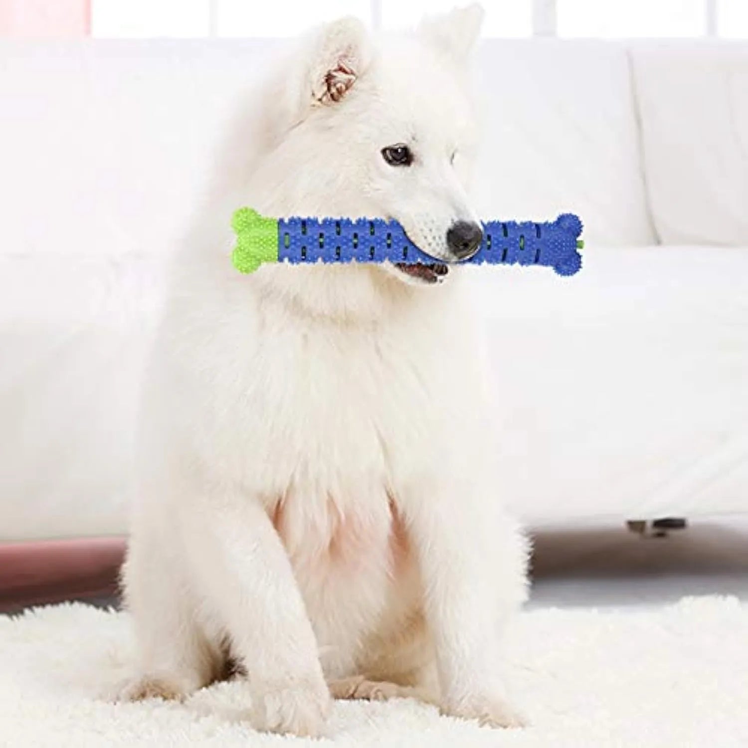 Blue green silicone dog dental cleaning stick toy with brush head design and massage nodules