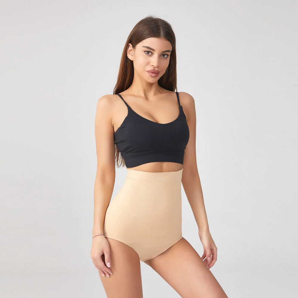 Plus size seamless high waist waist girdle in black and skin color, available in sizes XS to 4XL.