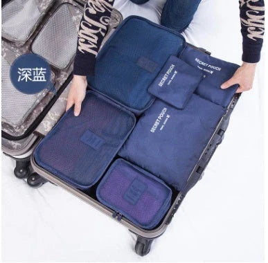 Durable waterproof packing cubes in various colors for organized, efficient travel