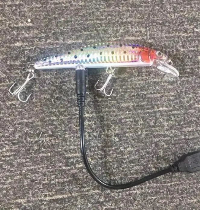 Rechargeable twitching fish lure with USB charging and LED light in the dark