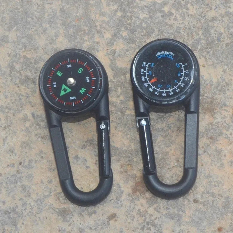 Black zinc alloy double-sided button carabiner with visible thermometer and compass gauge.