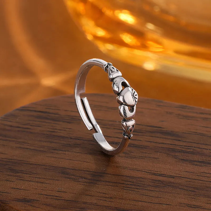 Open heart ring in retro silver colour with copper construction and adjustable design
