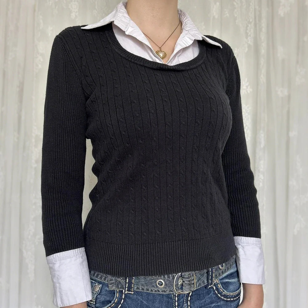 Black solid colour women's viscose pullover top showing front view with pullover styling