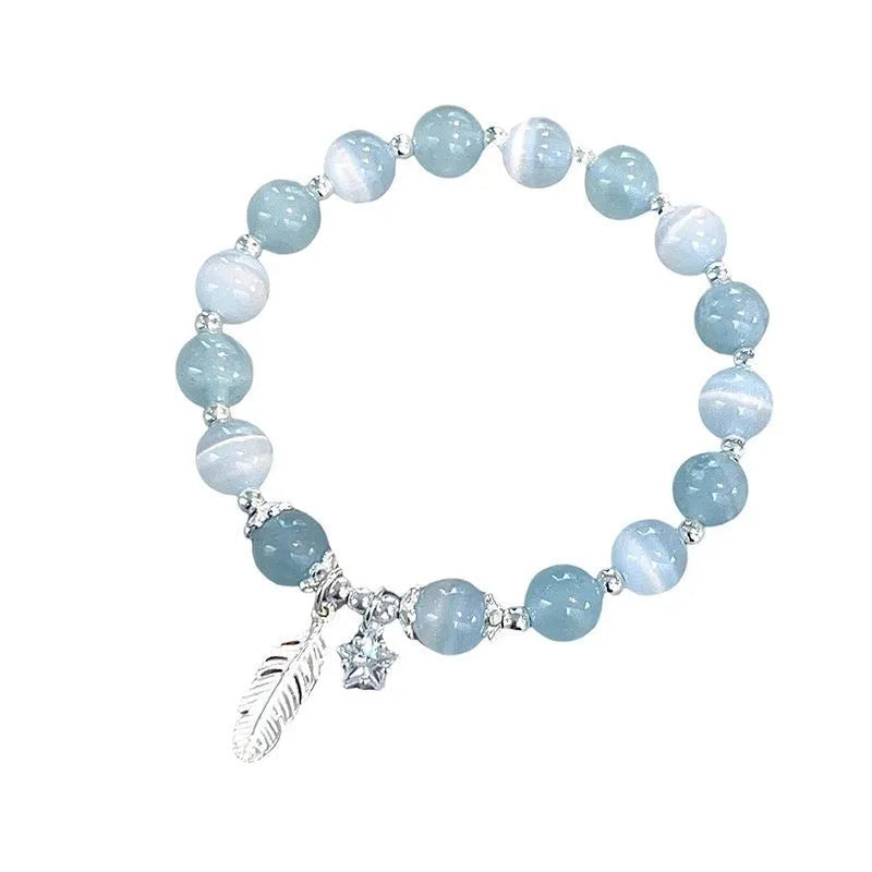 Korean style crystal bracelet with blue moonlight glass beads and eight pointed star charm