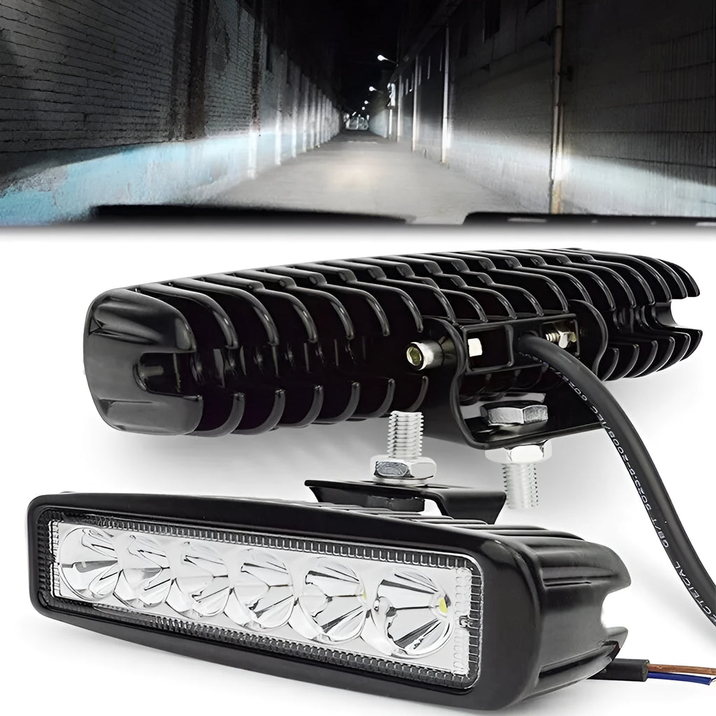 Black die-cast aluminium car auxiliary LED spotlight with white light, mounted on a bracket.