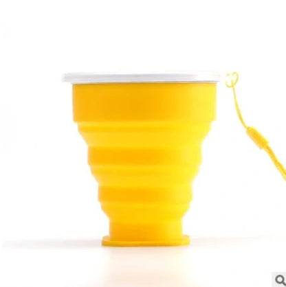 Collapsible stainless steel travel water cup showing expanded and compressed states