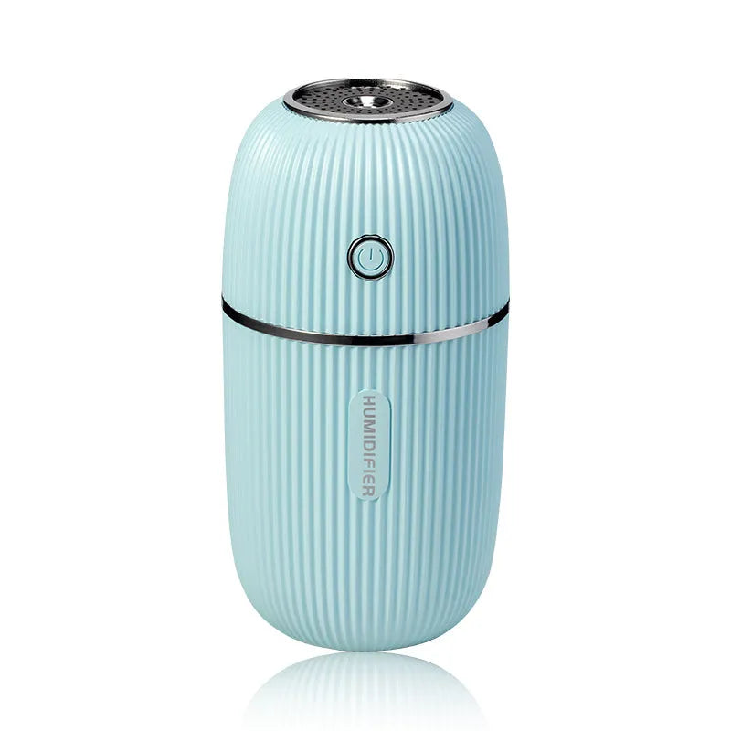 300ml USB ultrasonic mini humidifier with coloured LED lights in white on a desk