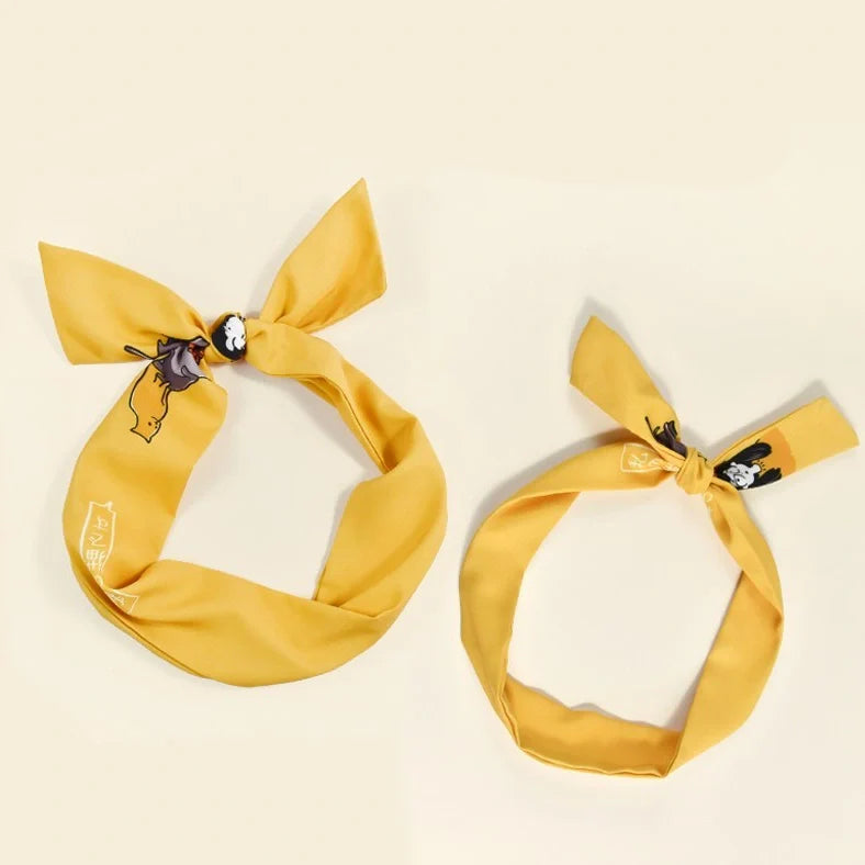 Blue and yellow cloth cat hair band with original tiara design measuring 3cm wide