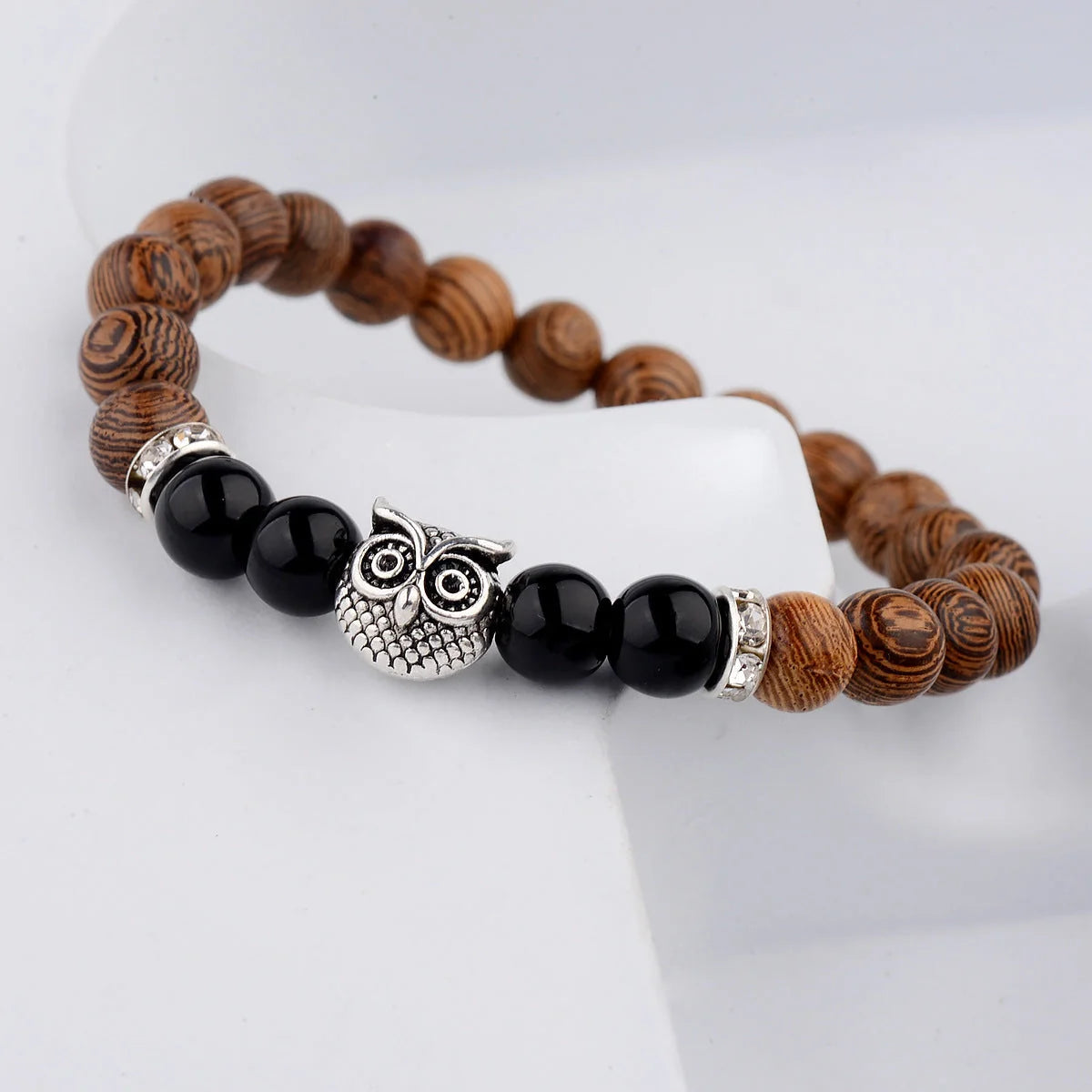 Owl frosted stone lifeline wood grain bracelet in black and gold, adjustable for a perfect fit
