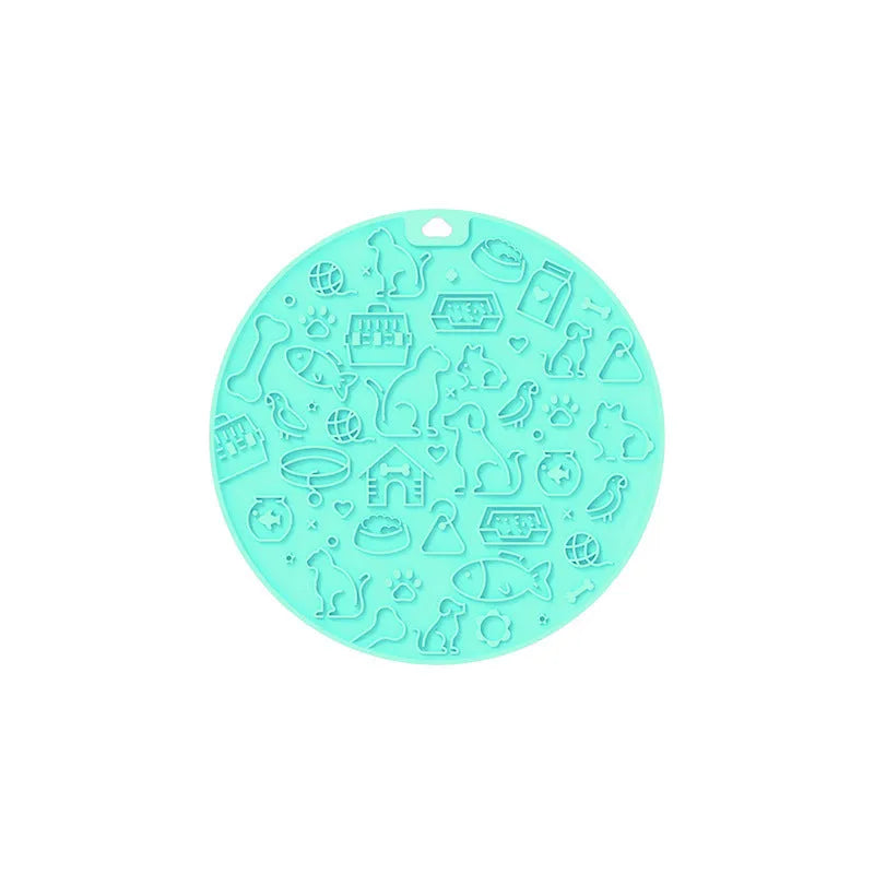 Round blue silicone pet licking mat with textured surface and central sucker on a white background.