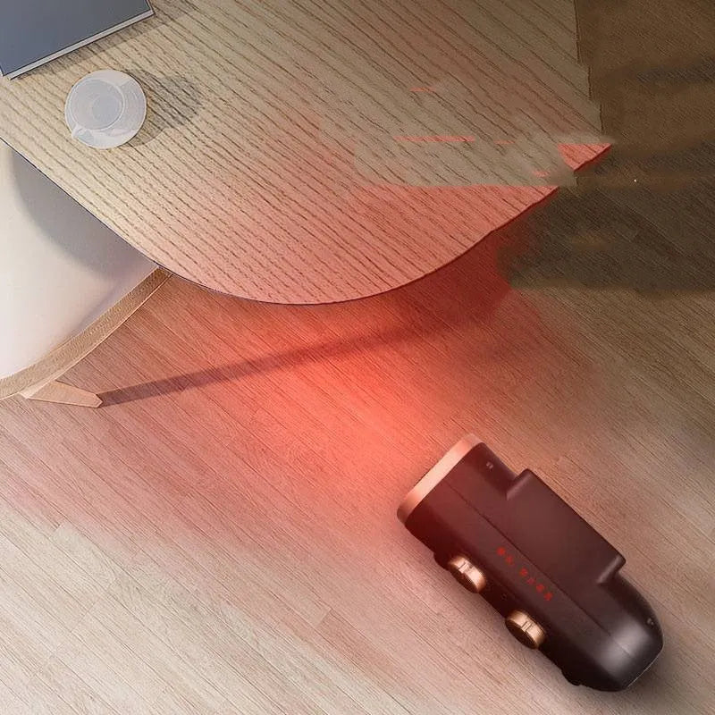 White and black gold portable electric fan heater with mechanical control knobs on the front.