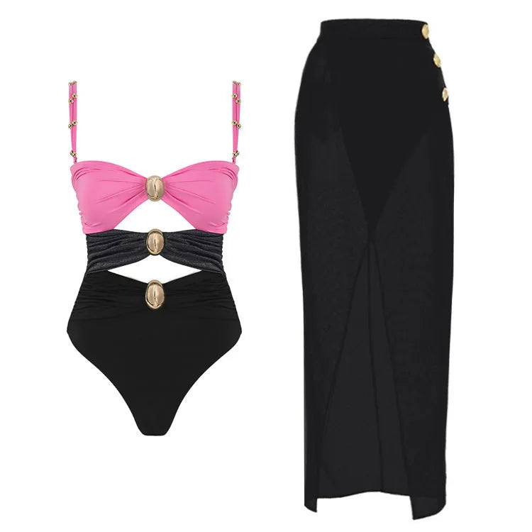 Women's solid colour one-piece swimsuit with detachable skirt featuring gold button detail